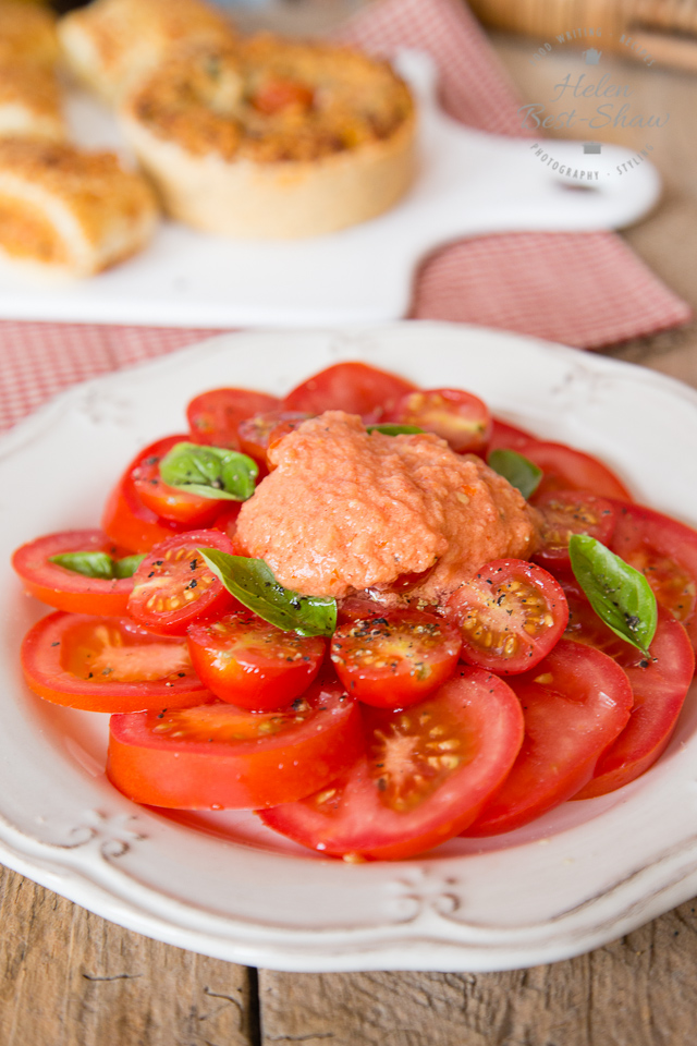 This simple salad celebrates different varieties of tomato, has rich and tasty tomato salad dressing and is perfect for lunch on a hot summer day.