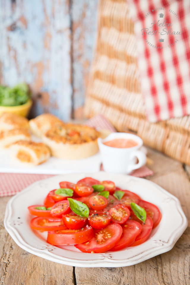 This simple salad celebrates different varieties of tomato, has rich and tasty tomato salad dressing and is perfect for lunch on a hot summer day.