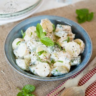 This healthy potato salad is made without mayo and includes cool mint and cucumber for a low heat, simple summer side dish.