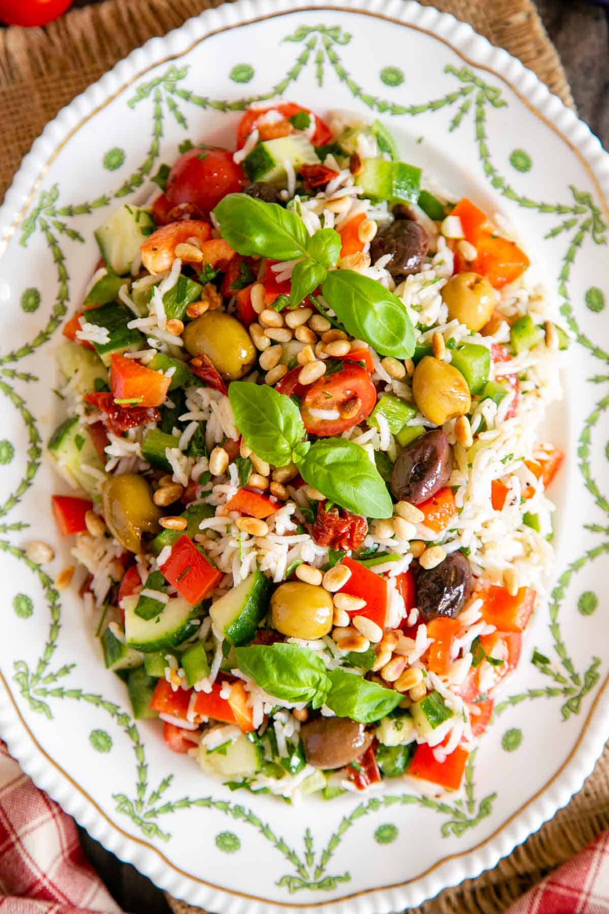 A top down view of red white and green Italian rice salad.