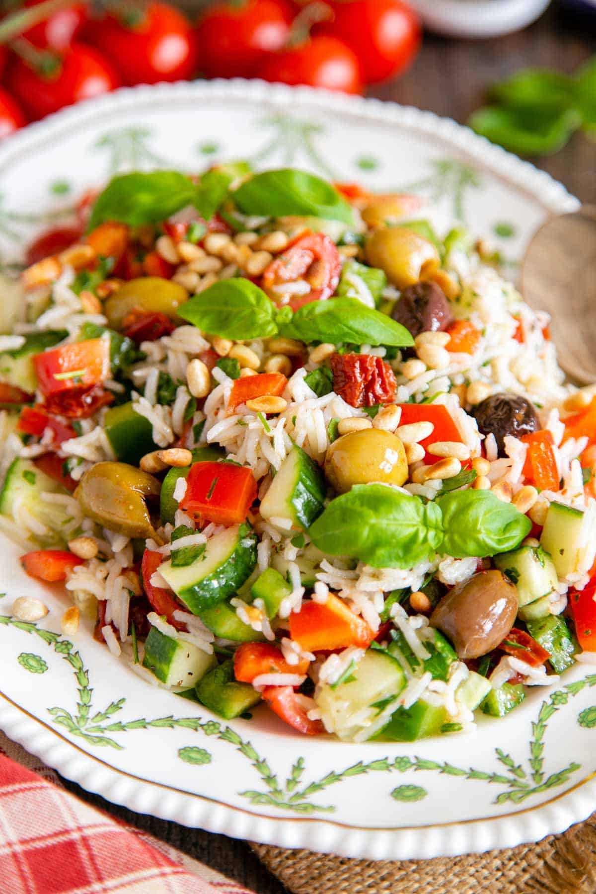 A close up view of Italian rice salad, white rice packed with vibrant vegetables and herbs.