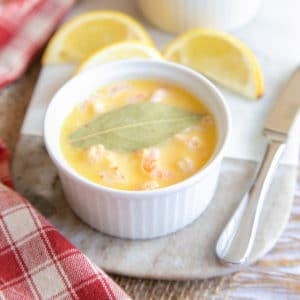 Potted shrimps in a a ramekin, ready to serve - a retro British dish that still feels fresh and vibrant.