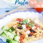 Dinner can be on the table in less than 15 minutes with this easy after work supper dish, inspired by the classic Greek salad. This vegetarian Greek salad pasta dish will transport you the islands and villages of Greece.