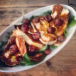 Pomegranate molasses baked grapes with fried halloumi