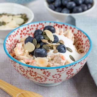 delicious bircher museli or overnight oats made with carrots, apple, orange and yogurt