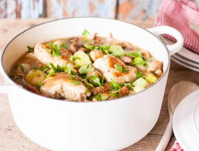 A simple French style chicken casserole with bacon and packed with vegetables - leeks, shallots and mushrooms, cooked on the stove top