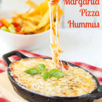 An easy vegetarian 4 ingredient recipe for baked hummus covered in pizza sauce and lots of melted cheese. Dip meets pizza is so delicious!