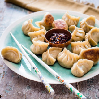 Guotie, the traditional Chinese phrase for pan-fried dumplings, literally translates to ‘pot stick’, hence the popular name for these dumplings. The combination of a lush, juicy pork filling and crispy golden bottoms is so divine that stopping at one is impossible.