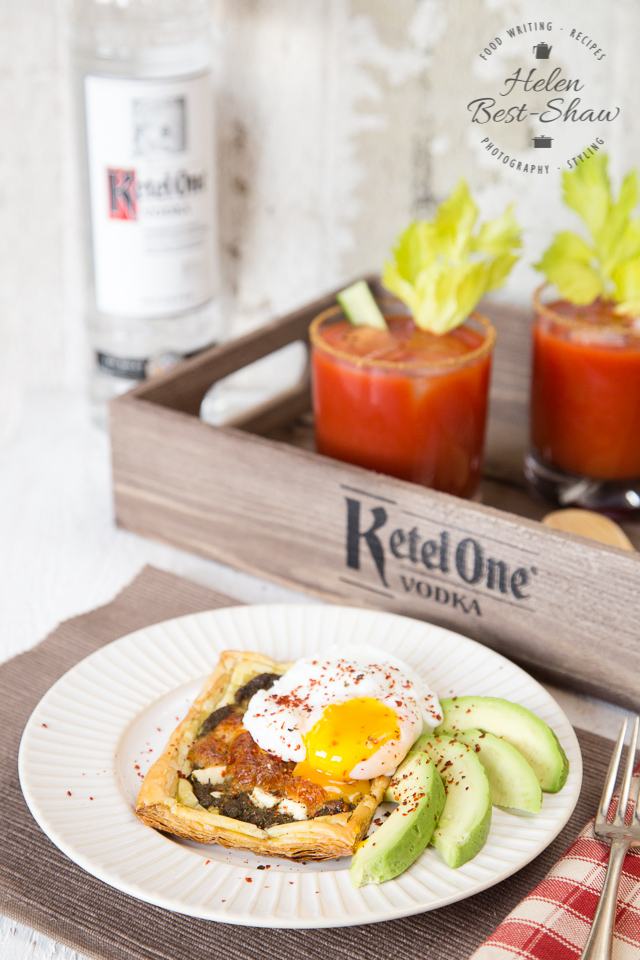 A perfect brunch - simple pesto and feta pastries with poached egg and avocado, served with a classic Bloody Mary