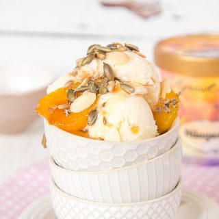 A delicate floral grown up apricot ice cream sundae, flavoured with lavender, topped with crunchy toasted sprinkles