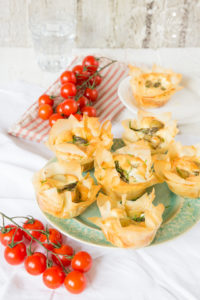 These individual vegetarian filo tarts are filled with new season potatoes, asparagus & goats cheese. Perfect for picnics.