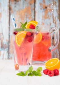 This refreshing cranberry, raspberry and orange mocktail is made with a surprising secret ingredient - Ricola boiled sweets!