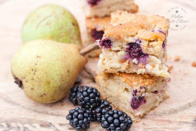 Enjoy this blackberry and pear traybake and use up unripe windfall fruit; it's perfect for picnics.
