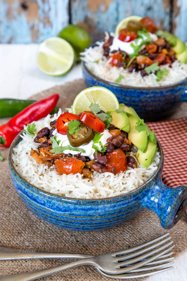 These black bean and tomato burrito bowls have a spicy kick from pickled jalapeños.