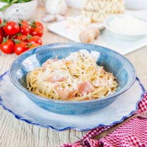 This easy twist on the everyday Italian classic of Spaghetti Carbonara is served with a generous sprinkling of Grana Padano and a scattering of Prosciutto di San Daniele