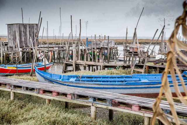 The ramshackle palafitte port of Carrasqueira is build on stilts and is a must visit on any trip to Portugal's Alentejo.