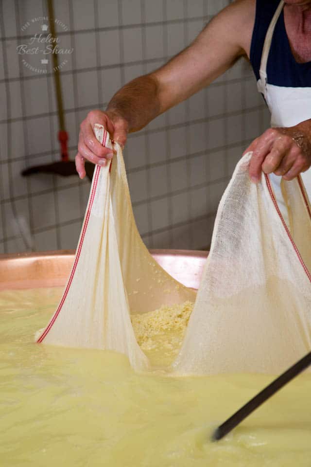 Straining the curds from the whey