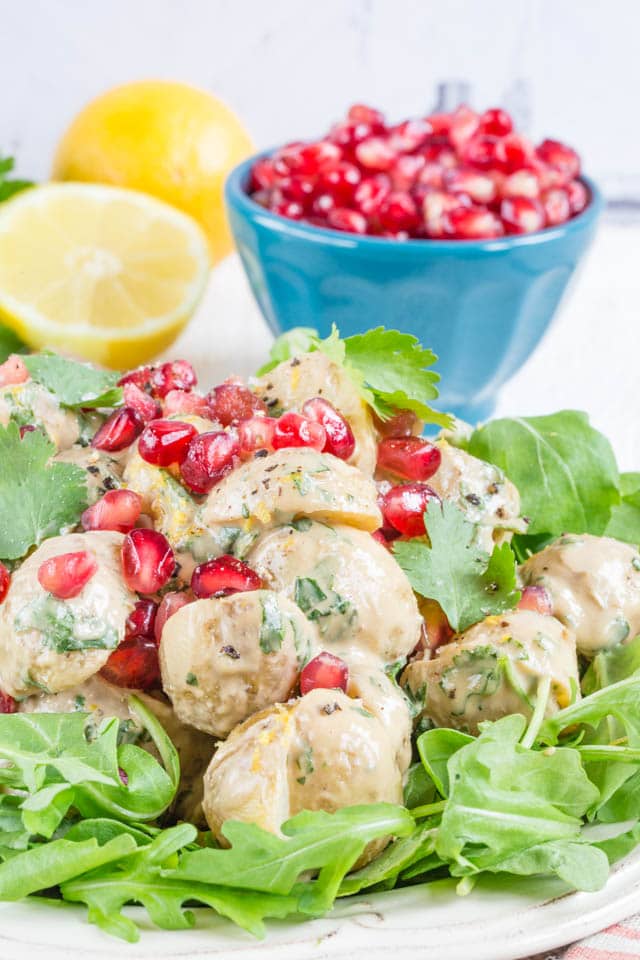 No mayonnaise potato salad with tahini and pomegranate is a delicious alternative to the traditional recipes for summer potlucks and BBQs. Vegan too