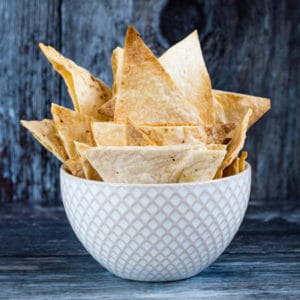 Make your own crispy tortilla chips, easily made from wraps and perfectly ready for you choice of dip.