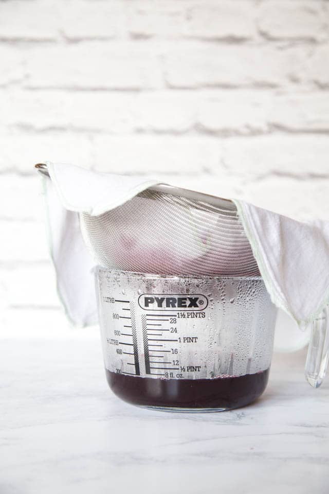 Strain the blackberry and apple for a jewel-clear jelly. Don't be tempted to squeeze or poke the bag!