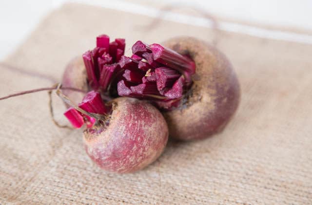 Bunch of fresh beetroot on a piece of hessian 