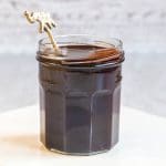 jar of dark and rich vegan chocolate sauce, made with just two ingredients