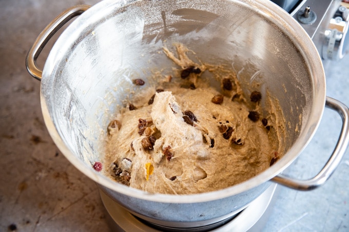 Adding the dried fruit to the dough