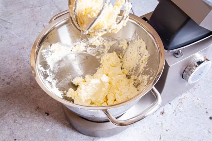 Cream in a stand mixer whipped until it's about to split.