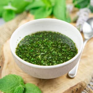 Close up of mint sauce in a small bowl.
