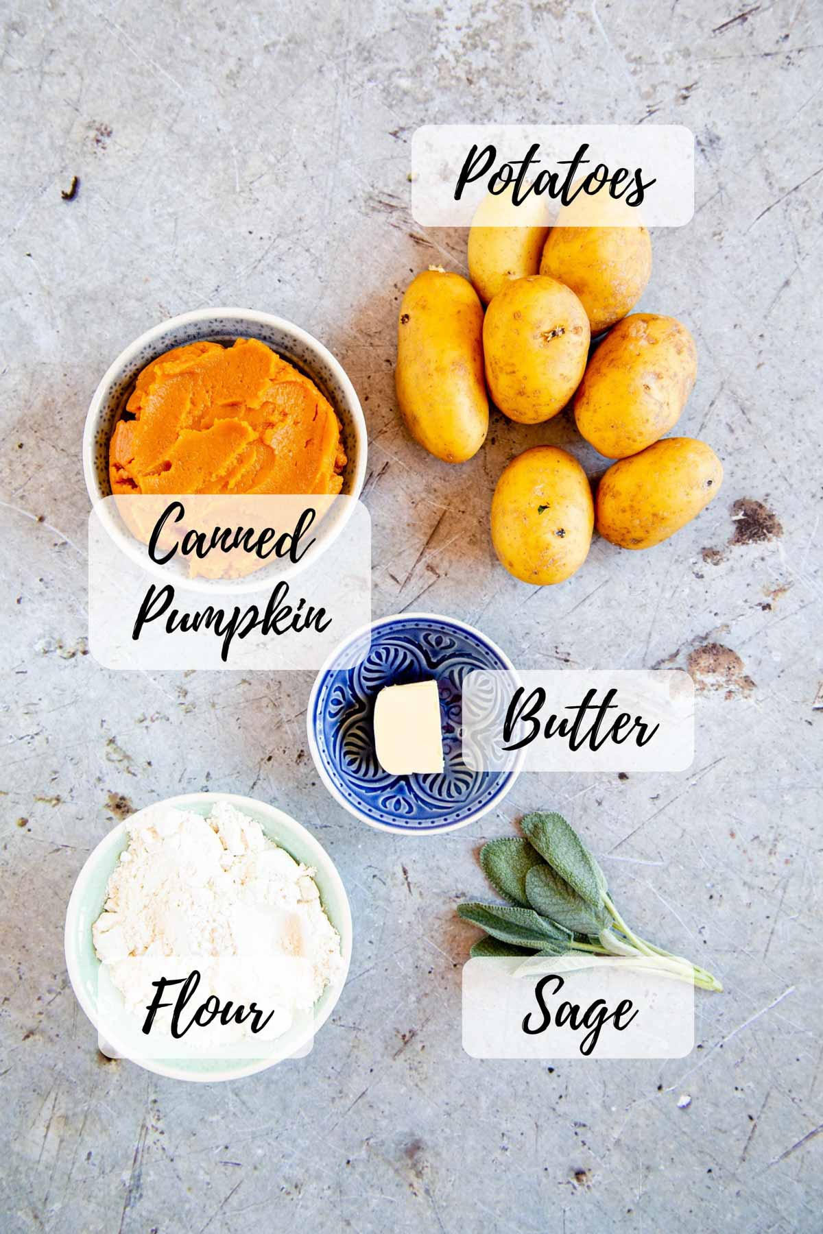 The ingredients gathered: canned pumpkin, potatoes, butter, sage and flour