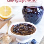 Bowl of blueberry jam and glass jar
