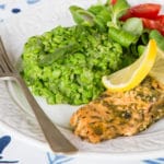 Close up showing how vibrantly bright green delicious crushed minted peas are.