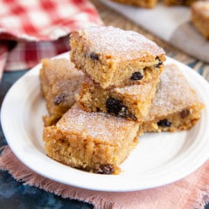 The finished blondies are shown, soft in the middle and dotted with spiced fruit