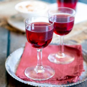 Delicious damson gin served in pretty glasses for the perfect homemade tipple.
