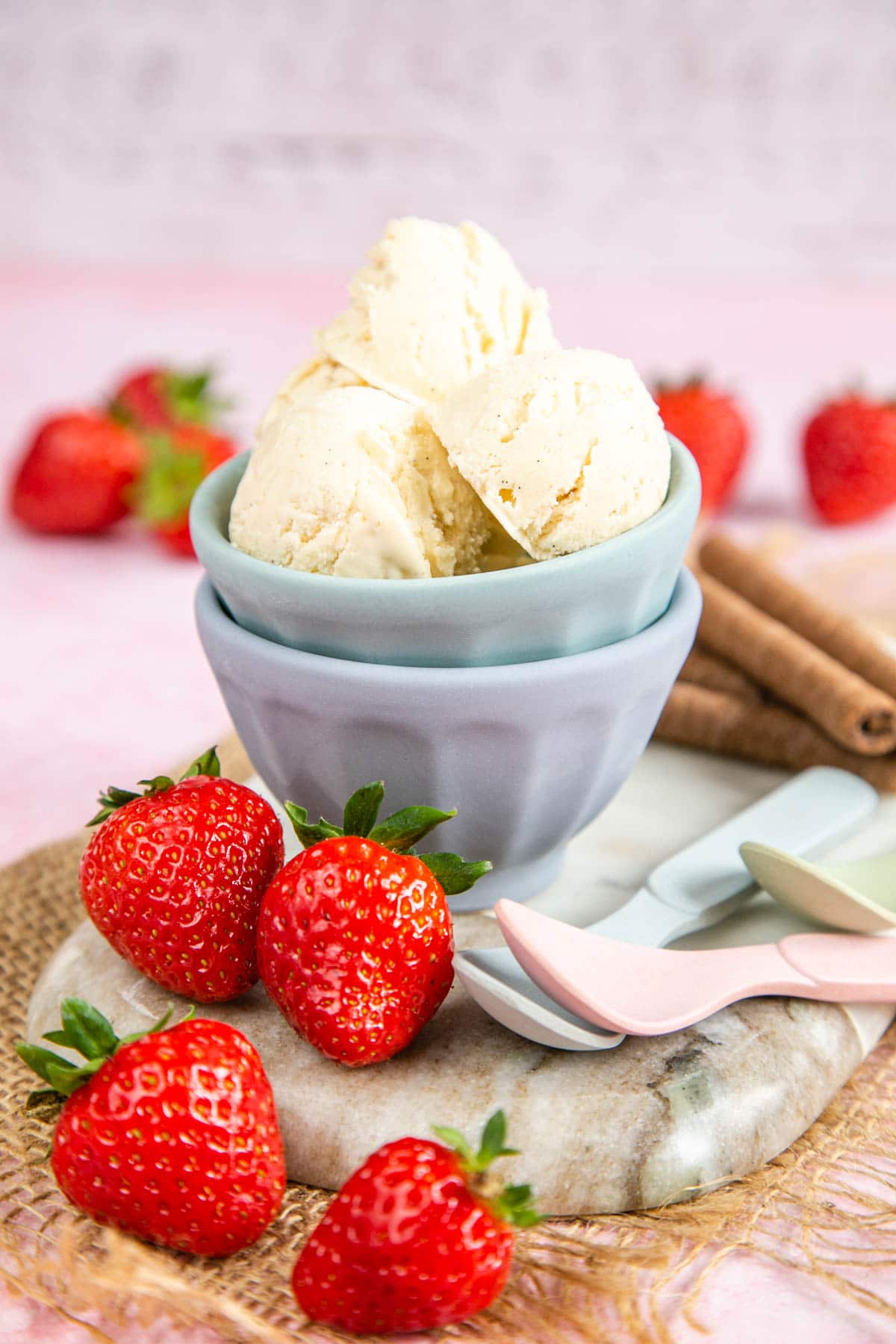 Delicious vanilla ice cream presented in a pretty bowl, ready to eat.