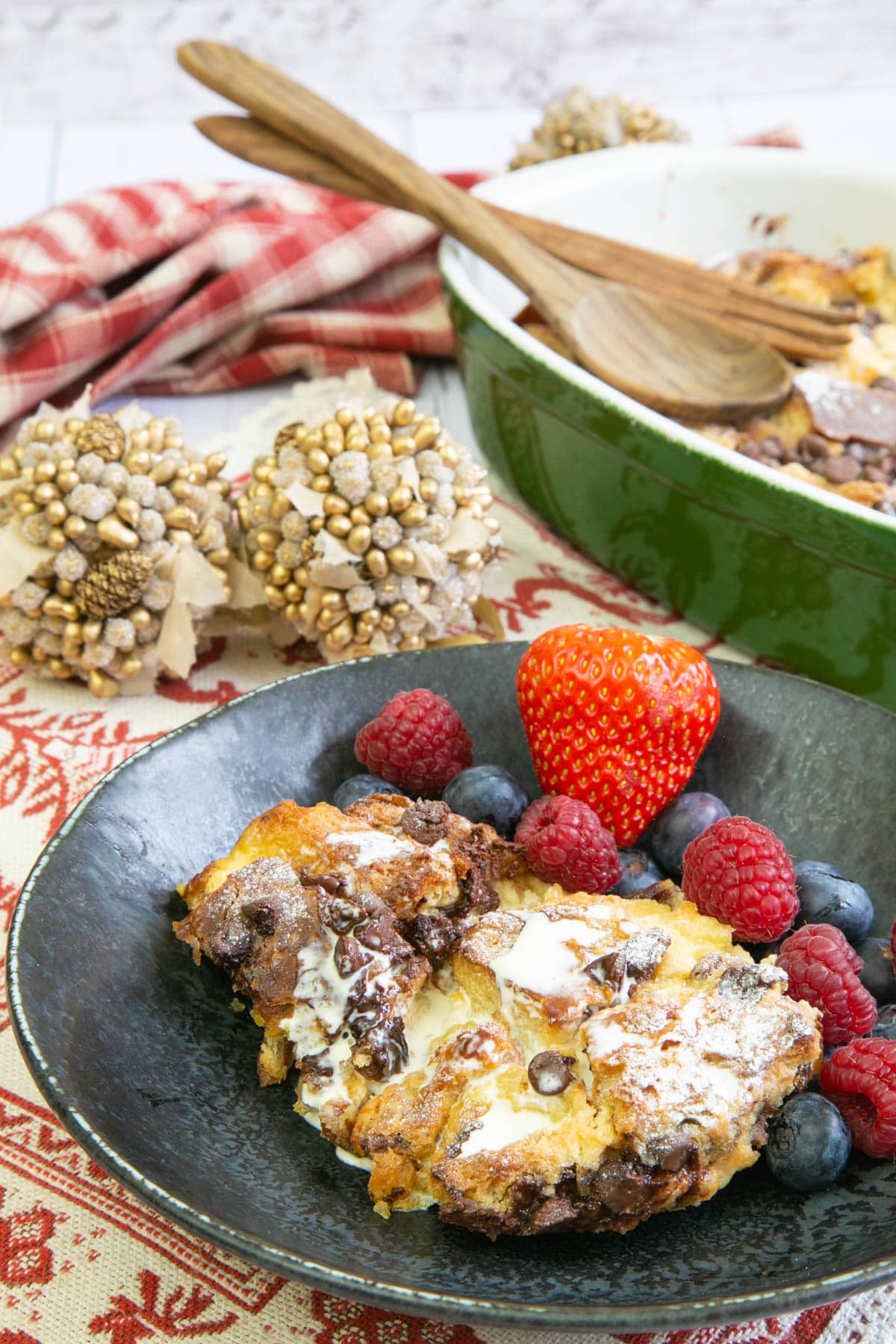 Fresh berries make the finishing touch for this gorgeous bread and butter pudding.