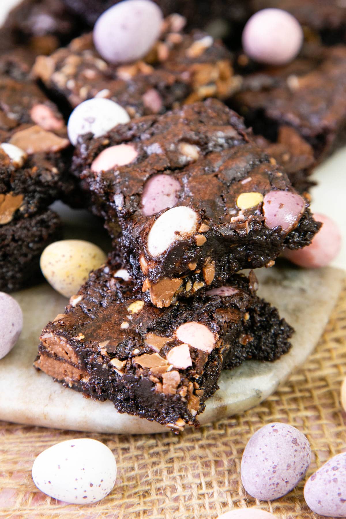 Rich, chocolatey mini egg brownies, ready to eat.
