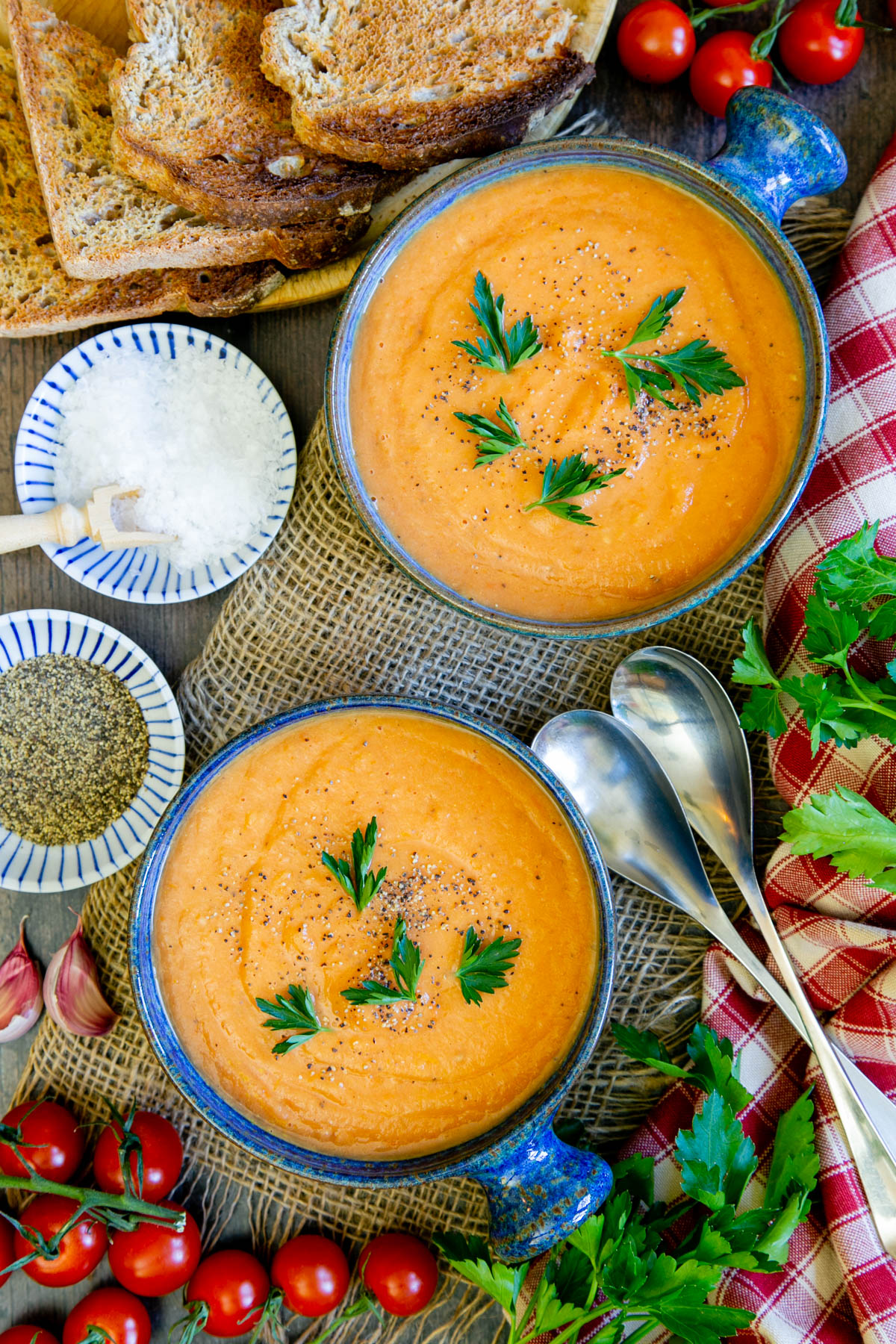 A contrasting garnish of fresh parsley sets off this vibrant Mediterranean soup.