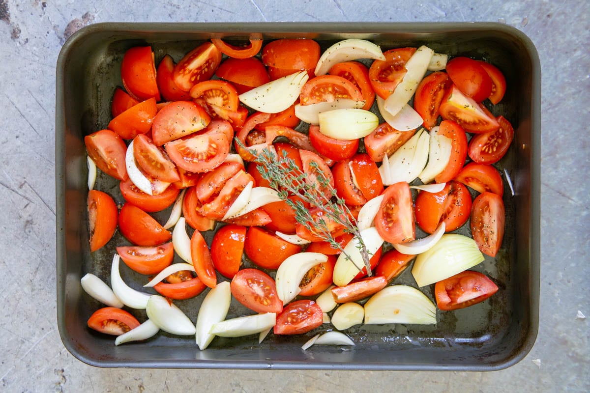 Spread the vegetables out in a single layer in the roasting tray before adding the herbs, seasoning and oil.
