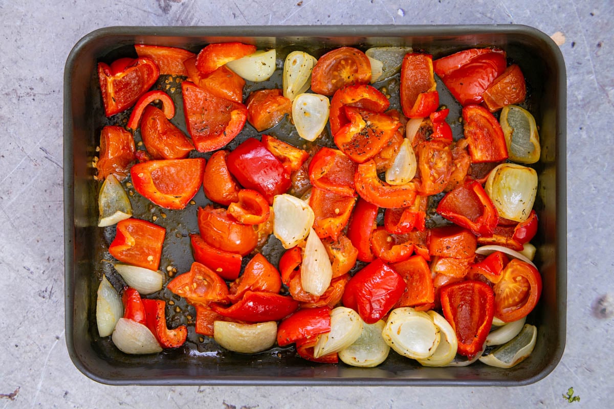 The roasted vegetables are soft, fragrant, and starting to colour.