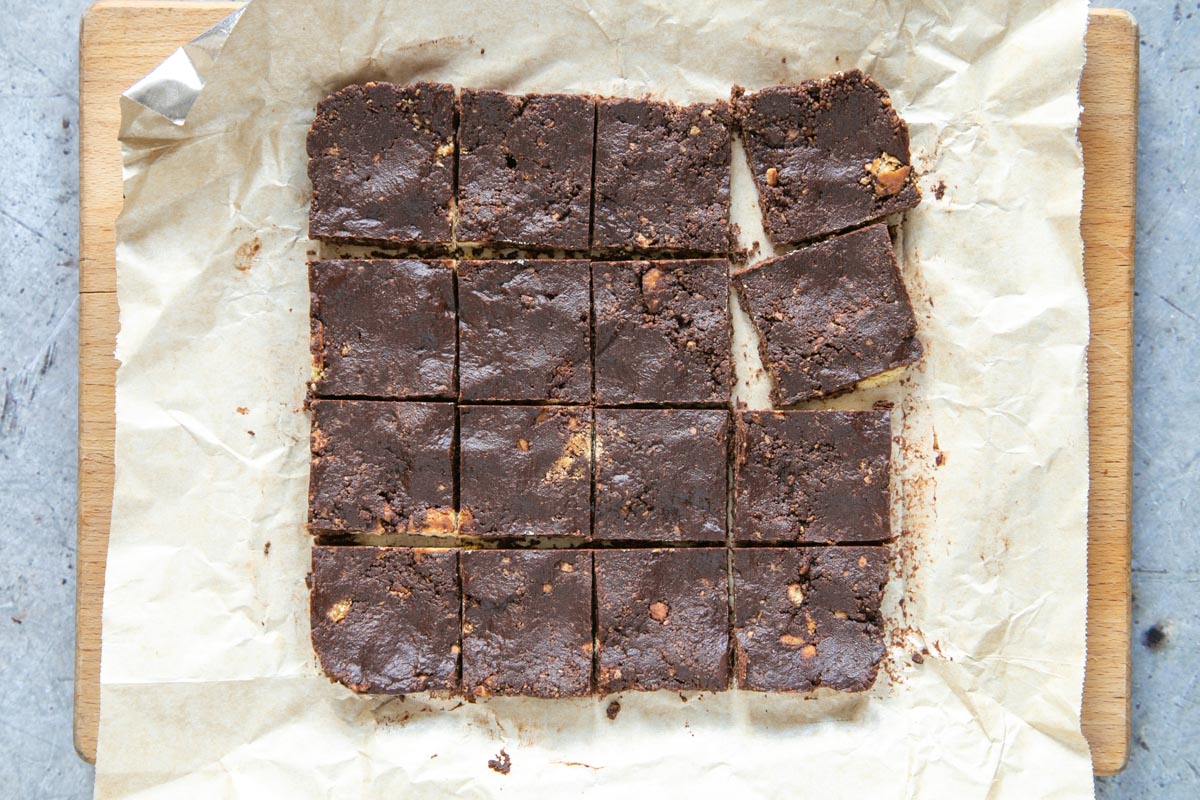 Once set, you can cut your chocolate tiffin into squares and serve.