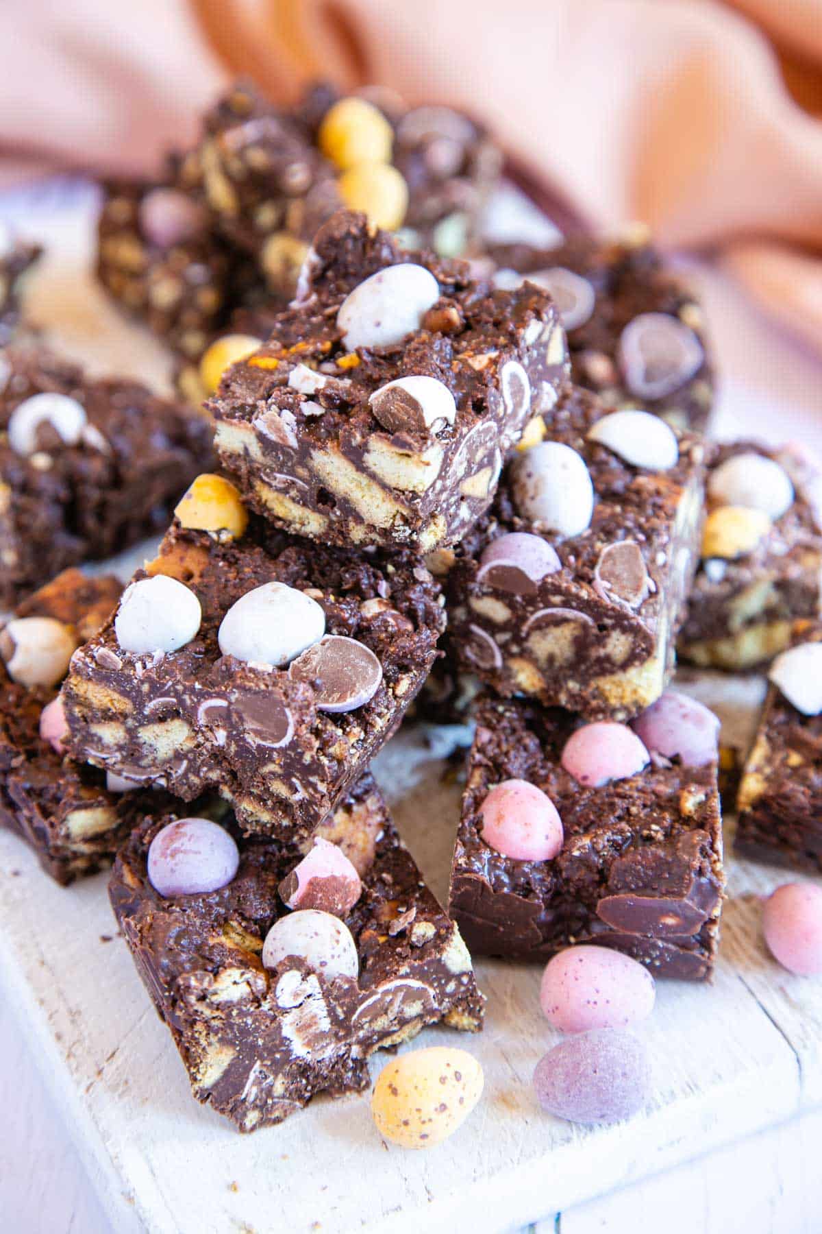 Delicious chocolate tiffin slices, dotted with colourful mini eggs.