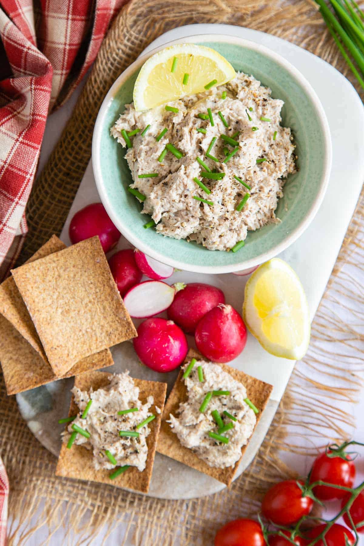 A deliciously light but satisfying lunch - mackerel paté with melba toast and radishes.