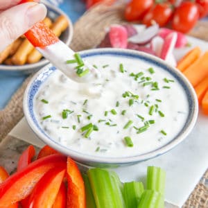 Cool and delicious sour cream and chive dip: perfect for scooping with fresh, crunchy veg.