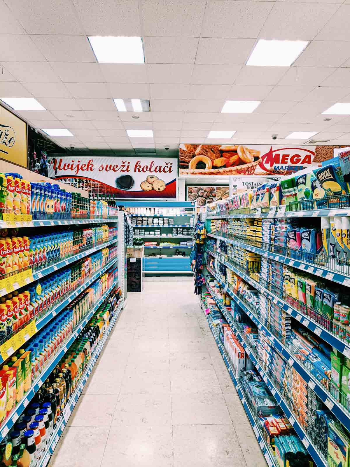 The interior of a supermarket in mainland Europe - with no salad cream on the shelves!