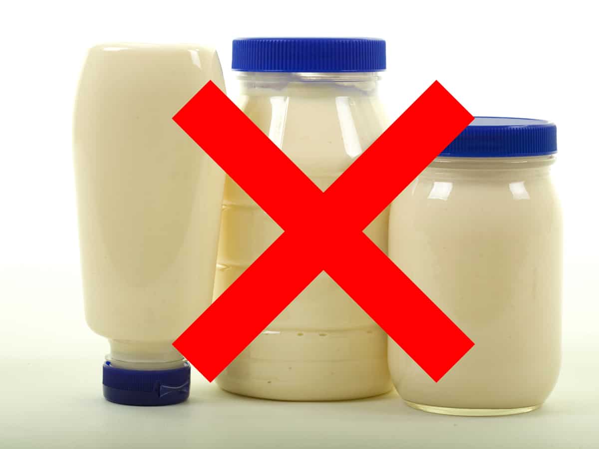 Three bottles of mayonnaise with a large red x - mayo is just not the same as salad cream.
