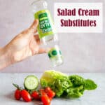 An empty bottle of salad cream refusing to give up a last drop for a fresh salad.