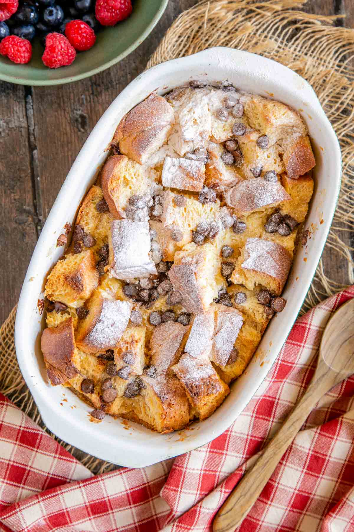 In close up, from above, the deliciously fluffy Irish cream bread and butter pudding in its serving dish.