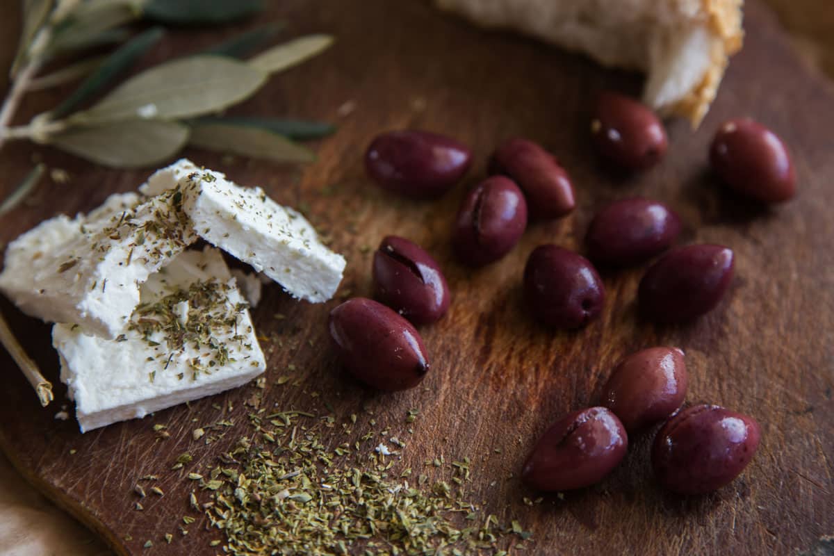 Kalamata olives and marinated feta cheese dusted with dried herbs - both strong and salty flavours to add interest to a salad.