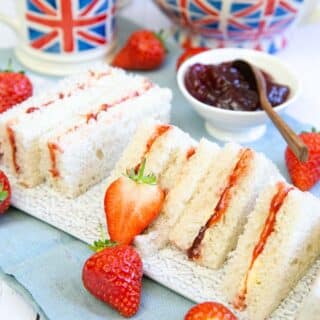 A spread of jam sandwiches for afternoon tea.